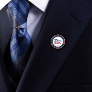 TSA 25th Anniversary pin on navy blue blazer